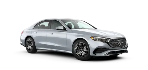 Silver Mercedes-Benz E-Class luxury sedan shown in a three-quarter front view against a black background, featuring a prominent chrome grille with the Mercedes star emblem, sleek LED headlights, multi-spoke alloy wheels, and a polished metallic silver exterior finish ideal for premium automotive e-commerce catalogs.